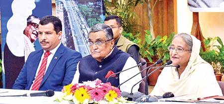 Prime Minister Sheikh Hasina opens the 8.7km Mouchak-Moghbazar flyover to traffic in the capital via video conference from her official Ganabhaban residence on Thursday.	photo: pid