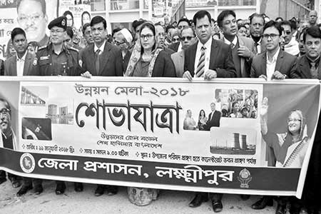 To mark the countrywide Development Fair-2018, rallies were brought out in Laxmipur (L) and Bogra, on Thursday. 	photos: Observer 
