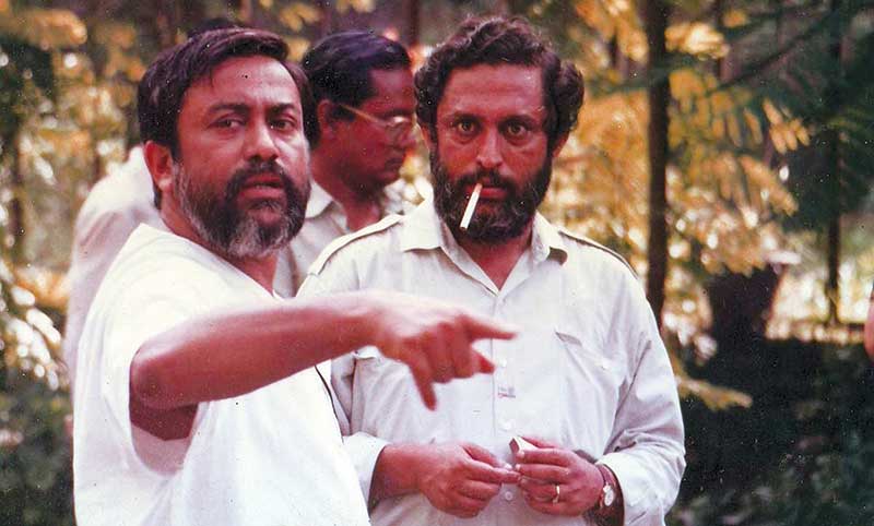 Cinematographer Anwar Hossain and Badal Rahman in Emiler Goenda Bahini (1980)