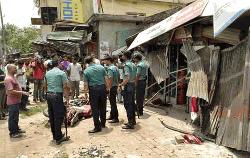 Bus hits bikes, ploughs through shop; 3 killed