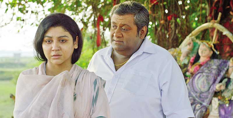 Joya Ahsan with Kaushik Ganguly in a scene from the film Bisarjan
