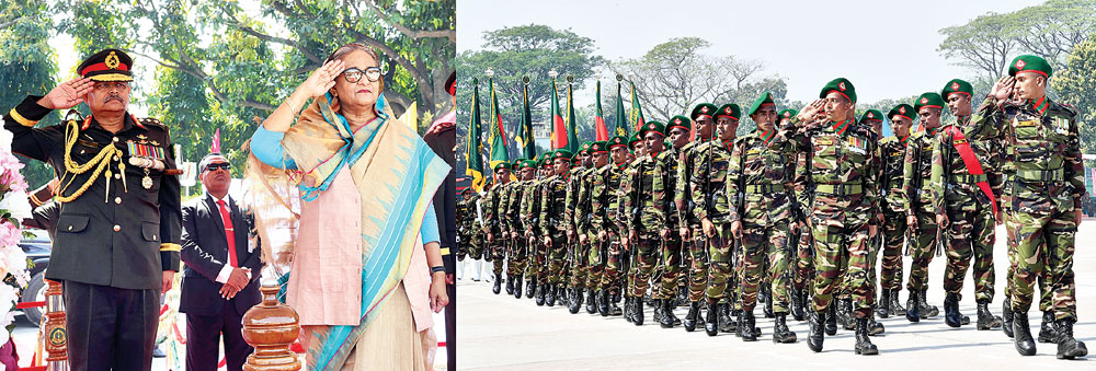 Prime Minister Sheikh Hasina takes salute at the 'national standard' handing over ceremony of the Bangladesh Infantry Regiments (BIR)-7th, 8th, 9th and 10th at Shaheed Colonel Anis Parade Ground at Rajshahi Cantonment in the city on Sunday. photo : pid