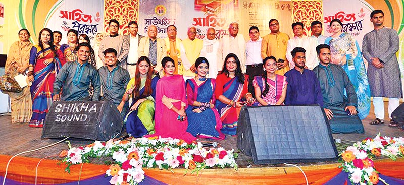 Awardees with organisers at the award giving ceremony