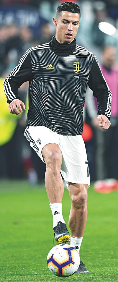 Juventus' Portuguese forward Cristiano Ronaldo controls the ball as he warms up prior to the Italian Serie A football match Juventus vs Udinese on March 8, 2019 at the Juventus Allianz stadium in Turin.	photo: AFP 