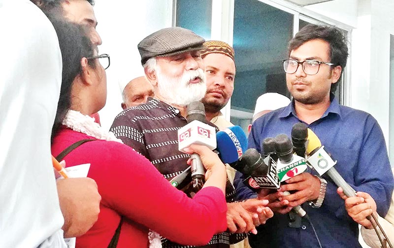 Shahidullah Farayezi speaks while attending the funeral rites