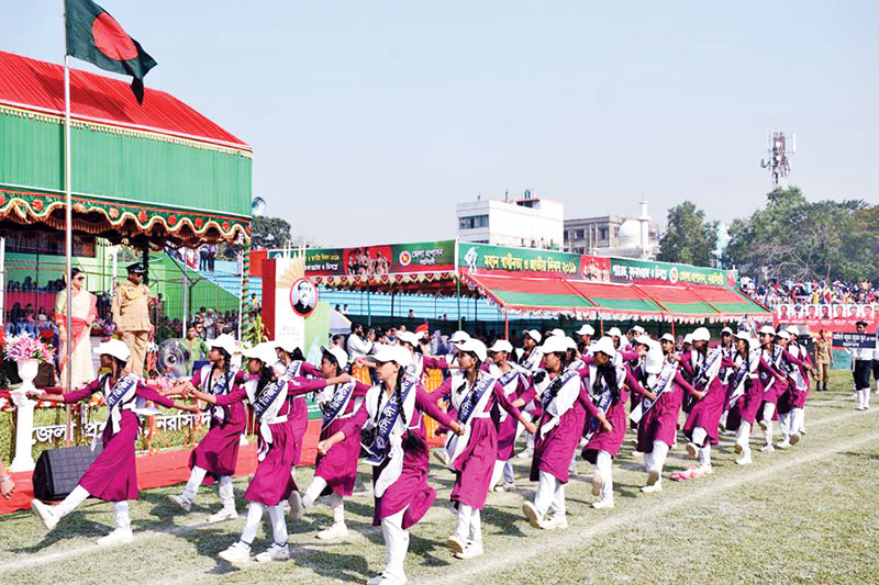 a march-past by the girl students held in Narsingdi