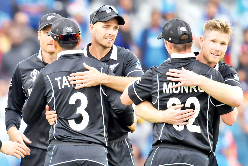 New Zealand's players celebrate victory during the 2019 Cricket World Cup first semi-final between New Zealand and India at Old Trafford in Manchester, northwest England, on July 10, 2019. - New Zealand beat India by 18 runs. Photo: AFP