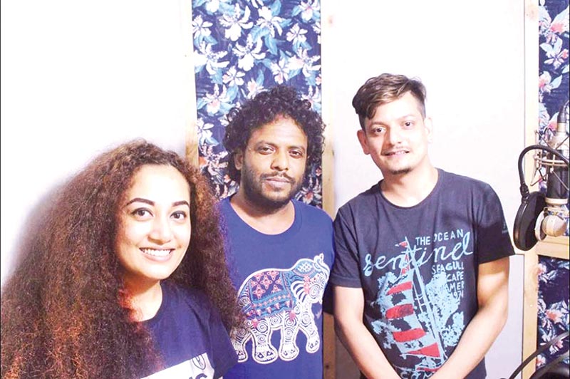 Nishita Barua, Lutfor Rahman and Shahriar Alam Marcell pose for a photograph