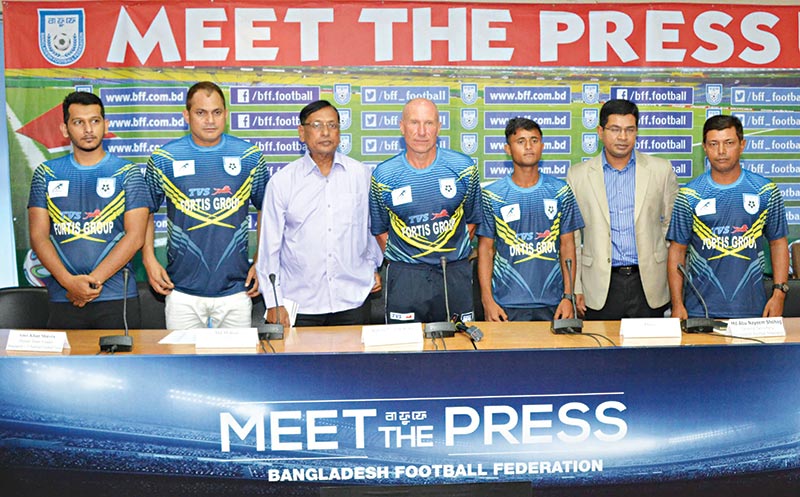 Officials and skipper of Bangladesh under-15 boys' national football team ahead of the SAFF Under-15 Championship 2019 on Sunday at the BFF House in Dhaka.