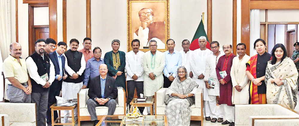 A 20-member delegation of Bangladesh Awami League, led by Presidium Member Abdul Matin Khasru, calls on Prime Minister Sheikh Hasina at Ganabhaban on Tuesday before leaving for China today.	photo : pid