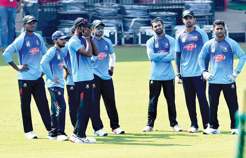 Bangladesh cricketers stand together during a training session at Holkar Cricket Stadium in Indore on November 12, 2019, ahead of the first Test match between India and Bangladesh.	photo: AFP 