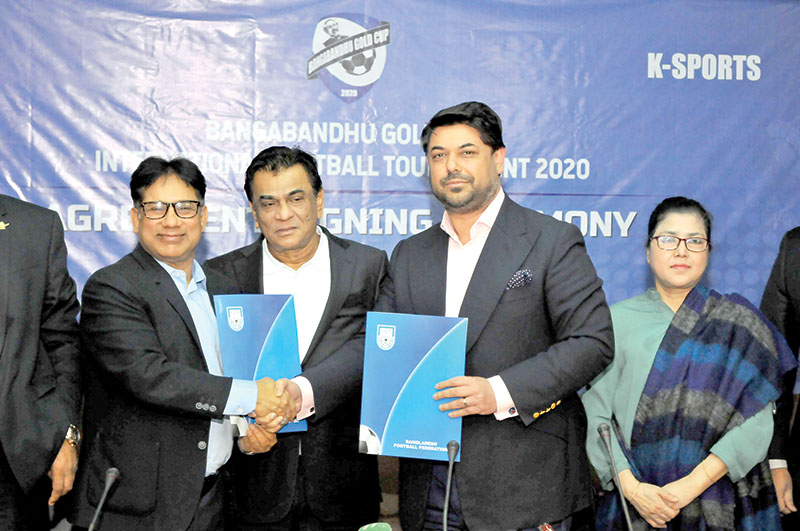 Bangladesh Football Federation (BFF) Senior Vice-President Abdus Salam Murshedy and K-Sports CEO Fahad M Abdul Karim, on behalf of their parties, sign contract regarding the upcoming Bangabandhu Gold Cup on Sunday at the BFF House in Motijheel, Dhaka. 	photo: BFF 