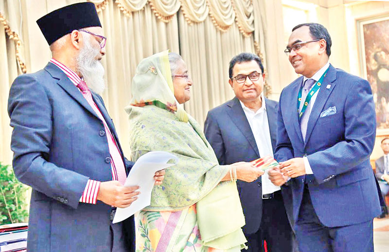 Prime Minister Sheikh Hasina received donation cheques from a number of banks on behalf of Bangabandhu Memorial Trust at her official residence Ganabhaban on Monday, ahead of the the 100th birth anniversary of Bangabandhu Sheikh Mujibur Rahman.