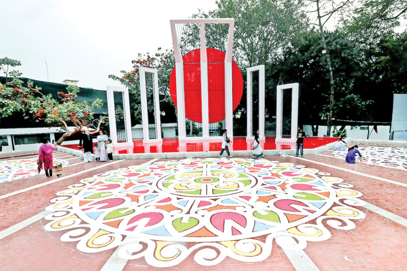 Exquisite floral motifs (Alpana) in enchanting colours were drawn at the Central Shaheed Minar on the eve of the International Mother Language Day today.	PHOTO: OBSERVER