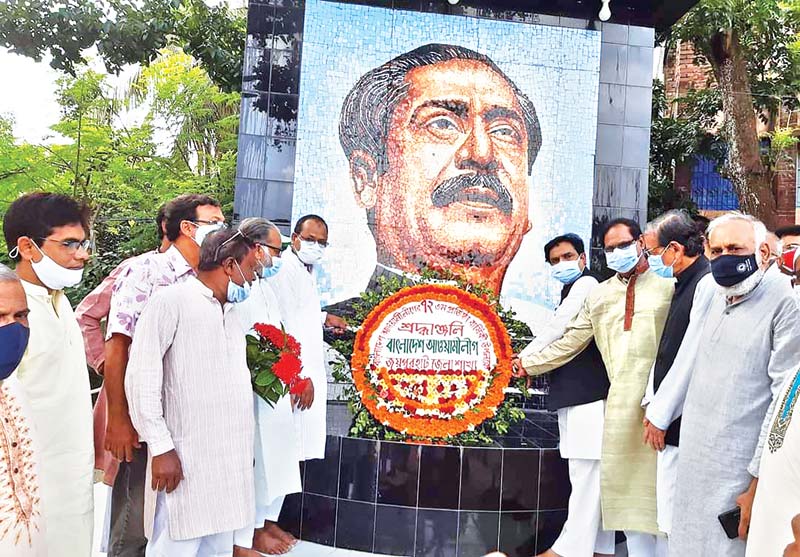 Wreaths being placed on the portrait of Bangabandhu Sheikh Mujibur Rahman in Gaibandha Town (L) and on the Central Shaheed Minar premises in Joypurhat on Wednesday.	photoS: observer