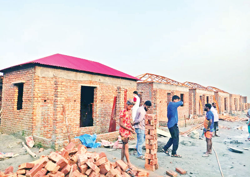 The construction work under Ashrayan Project-2 in Munshiganj is going on amid the  allegations of irregularities and use of low quality materials.	PHOTO: OBSERVER