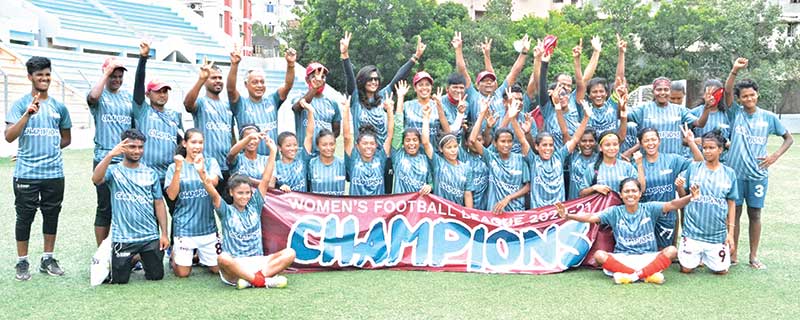 Players and officials of Bashundhara Kings Women's Football team celebrating after winning of the Women's Football League 2020-21 title defeating Jamalpur Kacharipara XI on Saturday at Shaheed Birshreshtha Sepoy Mustafa Kamal Stadium at Kamalapur, Dhaka. photo: BFF