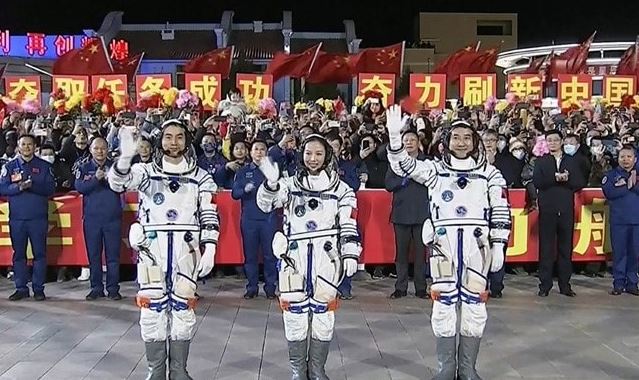 China rocket blasts off for longest crewed mission to space station