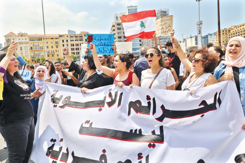 A group consisting mainly of Lebanese women protest to denounce violence