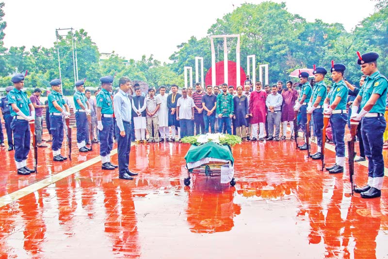 Late journalist Toab Khan was given the guard of honour at the Central Shaheed Minar in the city on Monday.	photo: observer