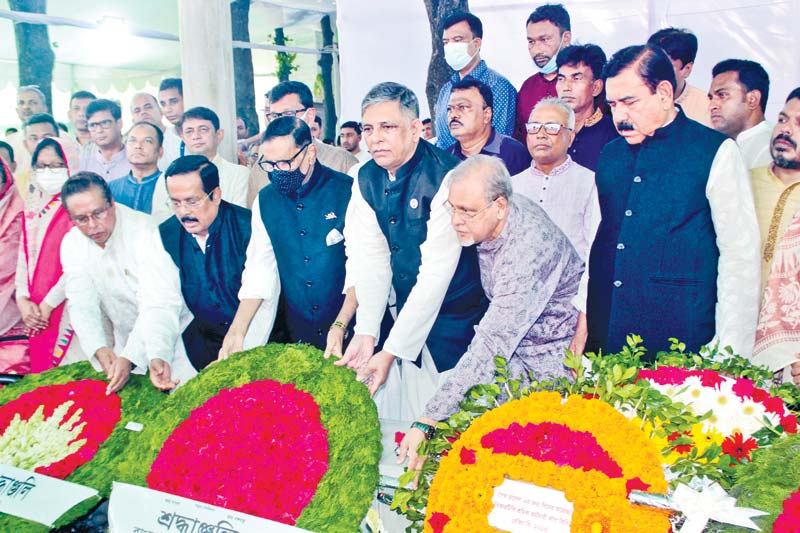 Leaders and activists of Awami League and its front organisations paying tribute to Sheikh Russell on his 59th birth day at his grave at Banani Graveyard in the city on Tuesday. 	photo : Observer 