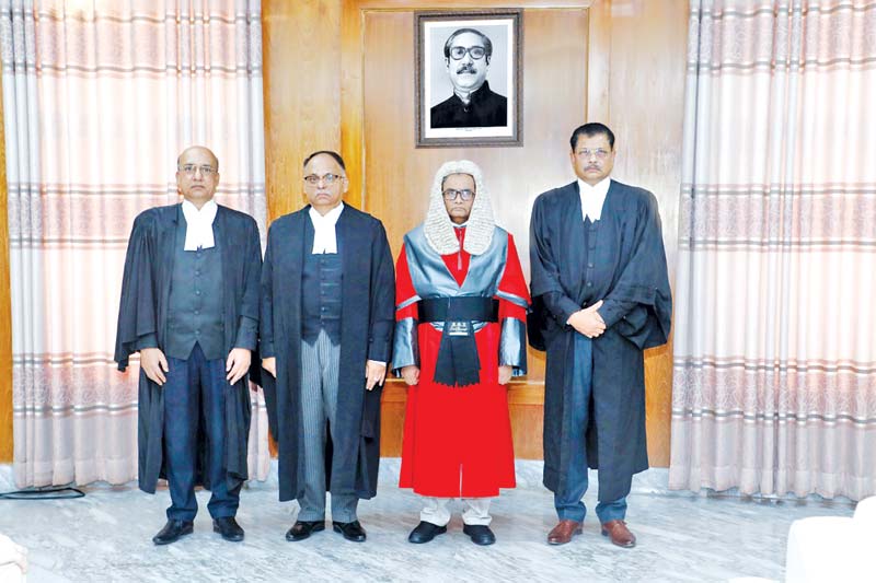 Three judges of the High Court Division of the Supreme Court, promoted to the Appellate Division, poses for a photo with Chief Justice Hasan Foez Siddique after taking oath at the Supreme Court Judges Lounge in the city on Thursday. 	photo : Observer 