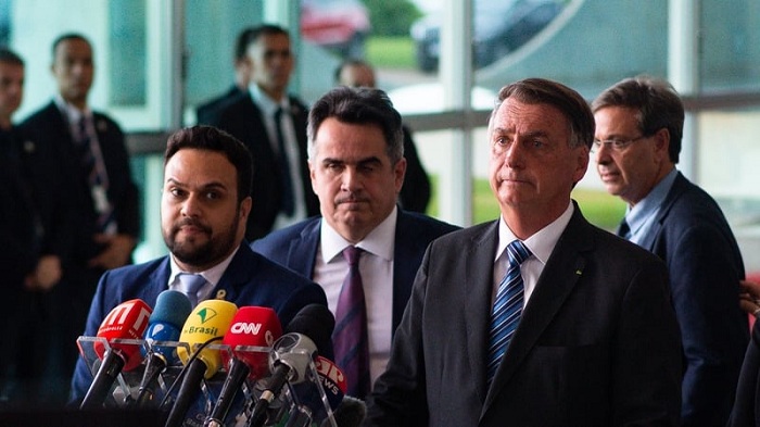 Outgoing Brazilian President Jair Bolsonaro (R) said he would not hand over the presidential sash to Luiz Inacio Lula da Silva 