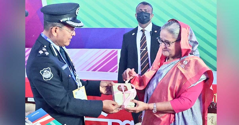 Prime Minister Sheikh Hasina unveils the cover pages of the book 'Chitipatra: Sheikh Mujibur Rahman' and its English version titled 'Letters of Sheikh Mujibur Rahman' while inaugurating the six-day Police Week-2023 at Rajarbagh Police Lines in the capital on Tuesday morning.