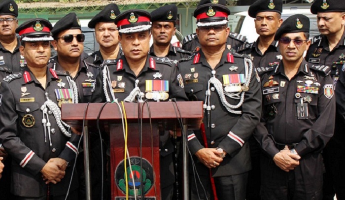  Rapid Action Battalion Director General M Khurshid Hossain talks to reporters  after placing a wreath at the portrait of Father of the Nation Bangabandhu Sheikh Mujibur Rahman at Dhanmondi Road 32 in the capital on Thursday.