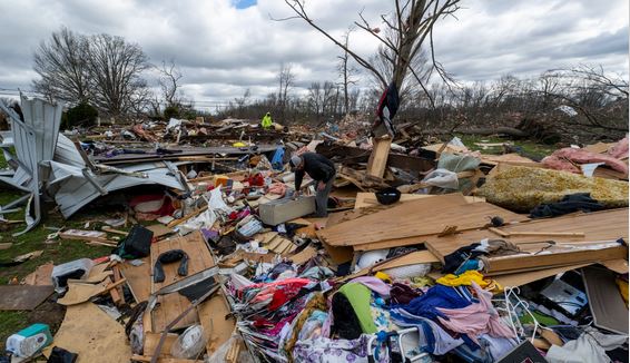 Death toll tops 21 as tornadoes tear through US Midwest, South