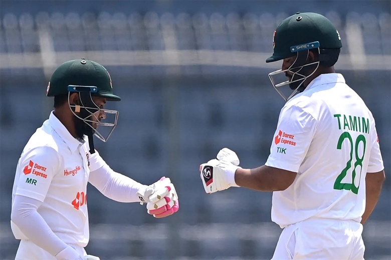 Tamim Iqbal and Mushfiqur Rahim reacts during their partnership in the one-off test against Ireland at Sher-e-Bangla National Stadium in Mirpur on Friday.