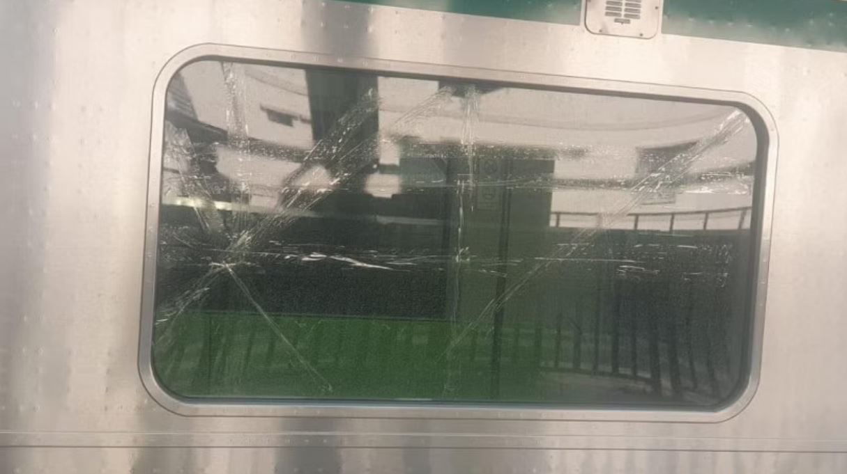 Miscreants hurl stone at metro train, window damaged
