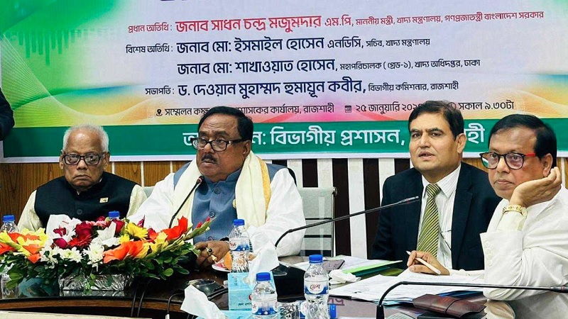 Food Minister Sadhan Chandra Majumder speaking a divisional level view-sharing meeting with stakeholders related to controlling rice price hike at the conference hall of Deputy Commissioner on Thursday.