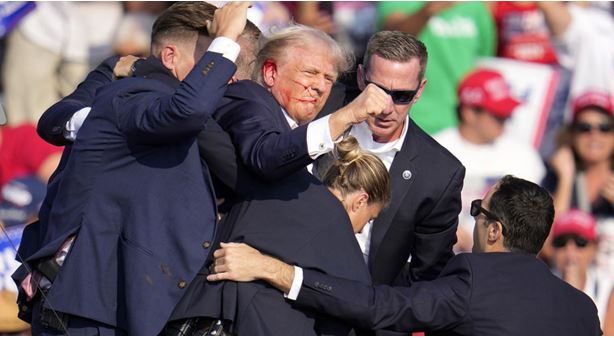 Biden calls for unity after Trump wounded at rally