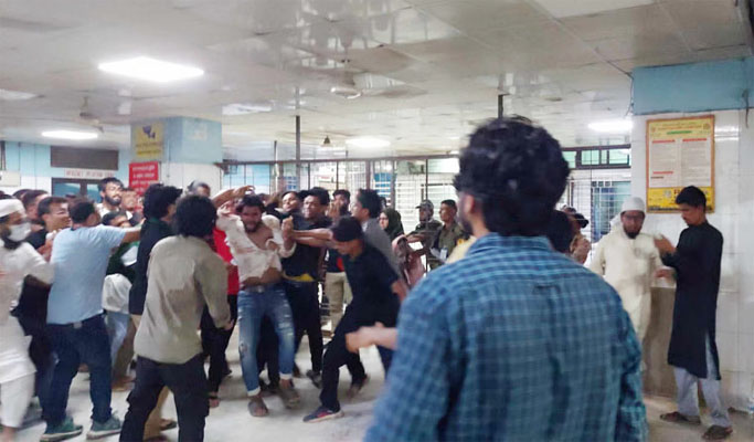 The photo taken at the DMCH, shows BCL men attack the quota reform activists on Monday evening. Photo Collected 
