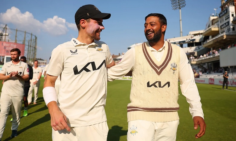 Rory Burns and Ryan Patel celebrate together• Getty Images for Surrey CCC