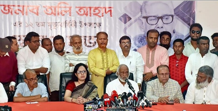 BNP standing committee member Abdul Moyeen Khan (3rd from left) speaks at a memorial meeting on 12th death anniversary of language veteran Oli Ahad at National Press Club in Dhaka on Saturday (October 26).