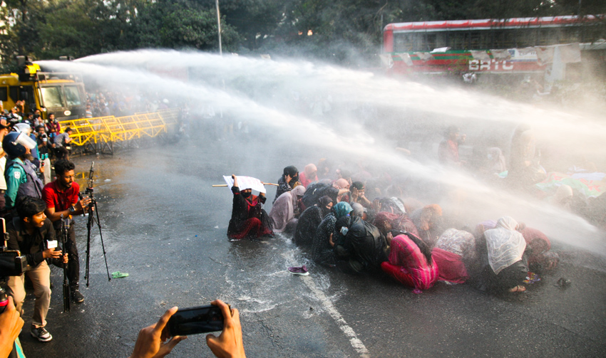 Police uses water cannons to disperse assistant teacher candidates protesting at the Secretariat on Sunday. Photo: Sumit Ahmed