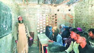 Shaheed Ziaur Rahman College at Charghat runs in risky building