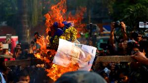 Women stage protest against Home Advisor's remarks, burn effigy