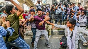12 sued over attacking police during anti-rape march