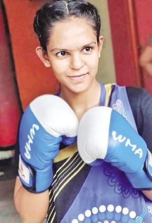 Sisters carve sporting glory in boxing and football 