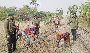 Ansar, VDP members mend 3km road in Gauripur 