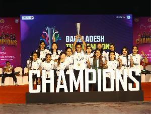 Victorious women's team returns home