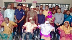 Wheelchairs distributed among disabled persons