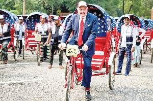 Tricolour rickshaws launched in Dhaka 