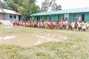 Classroom shortage, water-logging disrupt academic activities at Chilmari school 
