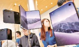Apple's foldable iPhone hits stores with $2,000 price tag and scarce supply