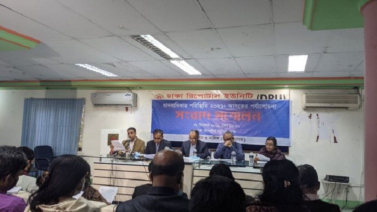 Officials of Ain-o-Salish Kendra (ASK), a local human rights organisation, addressing a press conference at Dhaka Reporters Unity in the capital on Friday.