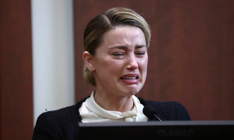 Actor Amber Heard testifies in the courtroom at the Fairfax County Circuit Court in Fairfax, Va., Thursday, May 5, 2022.